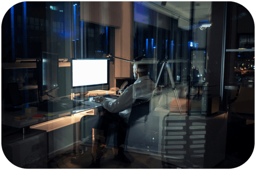 Burnout Stressed professional working late at night, symbolizing the stress of professionals Burnout Stressed professional working late at night, symbolizing the stress of professionals