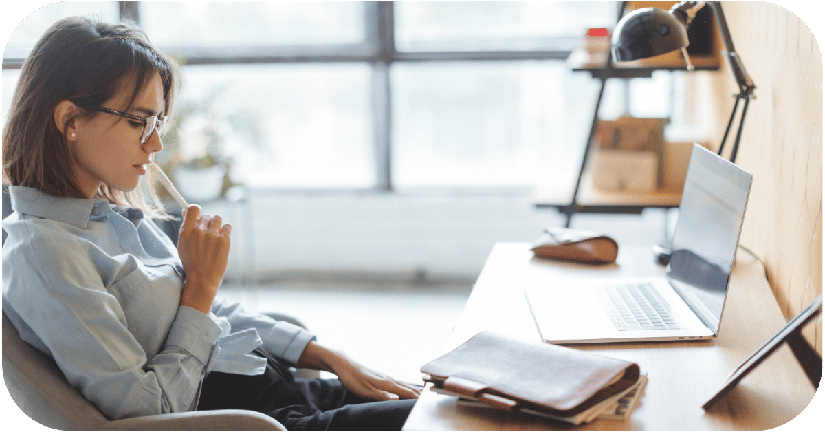 Woman staring struggling with overthinking at work 